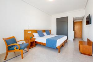 Postel nebo postele na pokoji v ubytování Hotel Vibra Vila