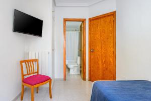 TV a/nebo společenská místnost v ubytování Hotel Vibra Vila