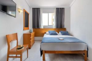 Postel nebo postele na pokoji v ubytování Hotel Vibra Vila