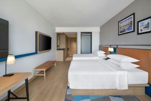 Postel nebo postele na pokoji v ubytování Four Points by Sheraton Chennai, Velachery