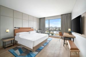 Postel nebo postele na pokoji v ubytování Four Points by Sheraton Chennai, Velachery
