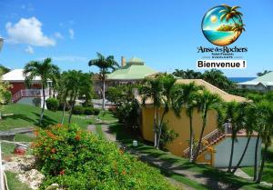 Zahrada ubytování Votre Oasis Tropicale + 18 fotografií