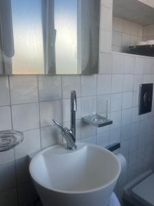 Et badeværelse på Appartement prestige, cour Paoli