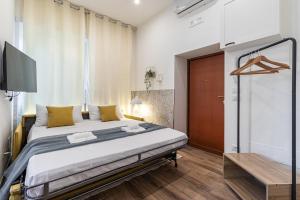 Katil atau katil-katil dalam bilik di Aeroporto Ciampino Elegant Suite WiFi AC