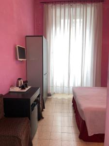 Posteľ alebo postele v izbe v ubytovaní Guest House Meret