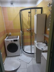 Kúpeľňa v ubytovaní Studio Miodowa