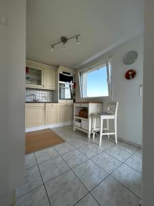 A kitchen or kitchenette at Apartment in Swiss Chalet Träumli