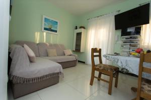 Et opholdsområde på Beachfront Holiday Home MaMi