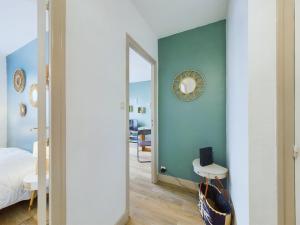 Postel nebo postele na pokoji v ubytování À 110 m de la plage, appartement moderne pour 4