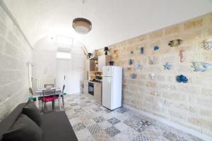A kitchen or kitchenette at Al Console Le Dimore Apartment