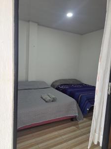 Postel nebo postele na pokoji v ubytování Apartamento Los Pinos