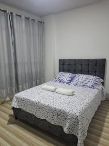 Postel nebo postele na pokoji v ubytování Apartamento Los Pinos
