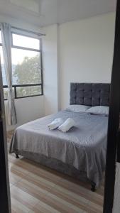 Postel nebo postele na pokoji v ubytování Apartamento Los Pinos