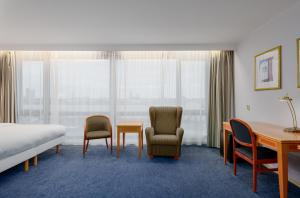 Voodi või voodid majutusasutuse Radisson Blu Hotel & Spa, Daugava Riga toas