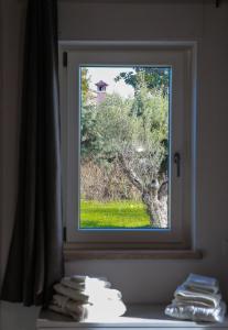 Postel nebo postele na pokoji v ubytování Guest House Montestallone