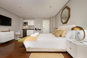 En eller flere senge i et værelse på Cathedral Suites II -Plaza del Obispo