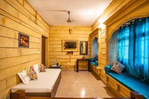 TV a/nebo společenská místnost v ubytování Relax Inn Jaisalmer + 37 fotografií