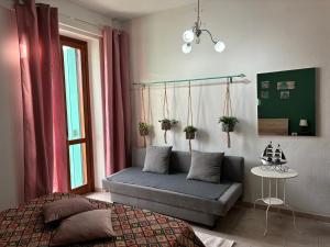 Posteľ alebo postele v izbe v ubytovaní Assajè Guestroom