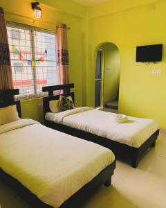 Llit o llits en una habitació de Red Tiger Resort