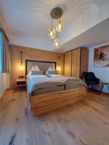 Postel nebo postele na pokoji v ubytování Hotel Gasthof Walcher