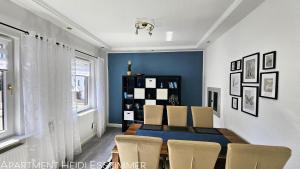 Posezení v ubytování Apartments am Saalebogen mit Gartenterrasse, Grillkamin und freie Parkplätze + 37 fotografií