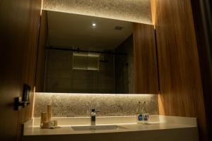 Ένα μπάνιο στο MantaHost Hotel