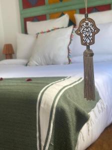 Postel nebo postele na pokoji v ubytování Dar Sydney