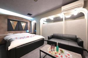 Postel nebo postele na pokoji v ubytování Hotel NEO