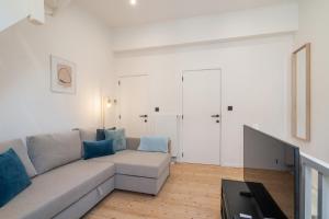 TV a/nebo společenská místnost v ubytování Gezellig, knusse en gerenoveerde rijwoning 4p + 3 fotografie