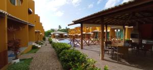 Restoran atau tempat lain untuk makan di Flat confortável e excelente para relaxar com a família