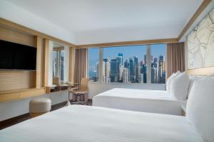 Katil atau katil-katil dalam bilik di The Park Lane Hong Kong, Autograph Collection