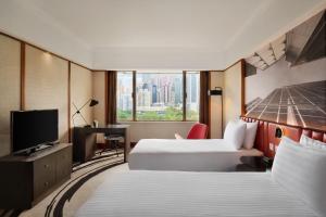 Katil atau katil-katil dalam bilik di The Park Lane Hong Kong, Autograph Collection