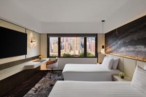 Katil atau katil-katil dalam bilik di The Park Lane Hong Kong, Autograph Collection