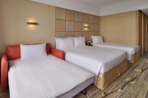 Katil atau katil-katil dalam bilik di The Park Lane Hong Kong, Autograph Collection