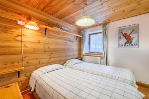 Letto o letti in una camera di Chalet complet