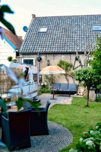 B&B Röderhaus Guesthouse Goedereede外面的花园
