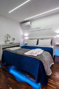 Posteľ alebo postele v izbe v ubytovaní Skyhouse Duomo