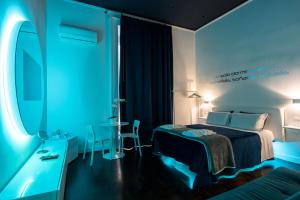 Posteľ alebo postele v izbe v ubytovaní Skyhouse Duomo