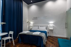 Posteľ alebo postele v izbe v ubytovaní Skyhouse Duomo