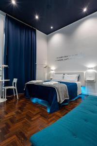 Posteľ alebo postele v izbe v ubytovaní Skyhouse Duomo