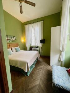 Posteľ alebo postele v izbe v ubytovaní Guest House Meret