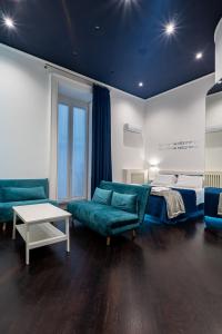 Posteľ alebo postele v izbe v ubytovaní Skyhouse Duomo