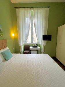 Posteľ alebo postele v izbe v ubytovaní Guest House Meret