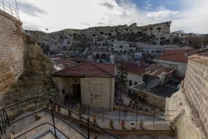 a view of a city with buildings and a mountain at Keyf i ala capadocia in Ürgüp