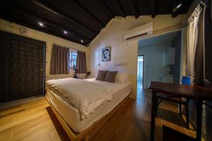 Voodi või voodid majutusasutuse 內之島旅宿 House toas