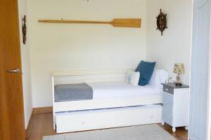 Łóżko lub łóżka w pokoju w obiekcie EARRA - Villa Eki - 2 garajes, playa a 7 min a pie