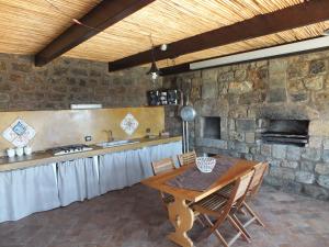 Kuchyň nebo kuchyňský kout v ubytování La Rosa Dell'alba