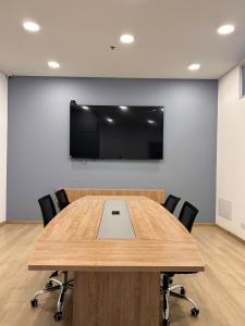 Un televizor și/sau centru de divertisment la Luxury loft Bogota
