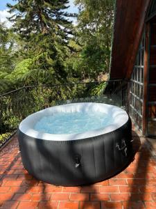 Gambar di galeri bagi Chalet con jacuzzi en Dapa di Dapa