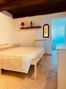 a room with a table with a white table cloth at Al Castello in Valeriano Lunense